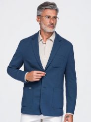 Męska slimowana marynarka SLIM z dzianiny o subtelnej strukturze – niebieska V6 - Rozmiar: L. Niebieskie garnitury męskie Ombre Clothing, l, bez wzorów, z bawełny, biznesowe, bez kołnierzyka, bez ramiączek. Za 379.99 zł.