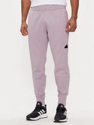 Adidas Spodnie dresowe Z.N.E. Winterized IR5245 Fioletowy Regular Fit. Fioletowe spodnie sportowe męskie Adidas, m, bez wzorów, z dresówki. Za 379.99 zł.