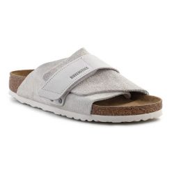Klapki Birkenstock Kyoto W 1024526 szare. Szare klapki damskie bez wzorów, z nubiku, sportowe, bez obcasa, bez zapięcia. Za 834.10 zł.