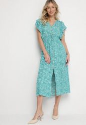 Zielona Bawełniana Sukienka Rozkloszowana w Cętki z Ozdobnymi Guzikami Alulune. Zielone sukienki damskie Born2be, na co dzień, l, bez wzorów, z bawełny, eleganckie, bez kołnierzyka, bez ramiączek, midi, kopertowe. Za 44.99 zł.