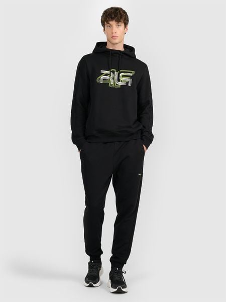 4F Spodnie dresowe joggery męskie 4F x Robert Lewandowski - czarne M. Czarne spodnie sportowe męskie 4F, m, z aplikacjami, z dresówki, na fitness i siłownię. Za 189.99 zł.