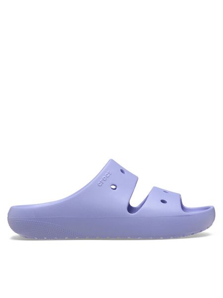Crocs Klapki Classic Sandal v2 209403 Fioletowy. Fioletowe klapki damskie Crocs, bez wzorów, z tworzywa sztucznego, bez obcasa, bez zapięcia. Za 135.15 zł.