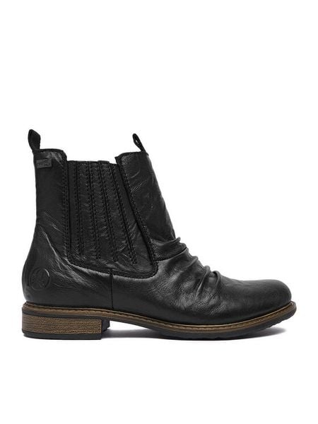 Rieker Botki CEO-74855-00 Czarny. Czarne botki damskie Rieker, bez wzorów, ze skóry, bez obcasa, na płaskiej podeszwie, bez zapięcia. Za 439.99 zł.