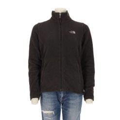 Damska czarna polarowa kurtka TNF. Czarne kurtki sportowe damskie The North Face, l, bez wzorów, z materiału, bez ramiączek, bez kaptura, trekkingowe. Za 170.36 zł.