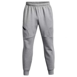 Spodnie Joggery Under Armour Unstoppable Flc Damskie. Szare spodnie sportowe damskie Under Armour, bez wzorów, sportowe, do biegania. Za 437.00 zł.