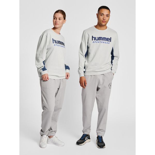 Bluza Hummel Legacy Wesley. Niebieskie bluzy damskie Hummel, m, bez wzorów, z bawełny, eleganckie, bez ramiączek, bez kaptura. Za 252.50 zł.