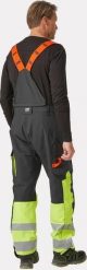 Helly Hansen Winter overalls HELLY HANSEN Alna 2.0, black/yellow C58. Czarne spodnie sportowe męskie Helly Hansen, m, bez wzorów. Za 650.40 zł.