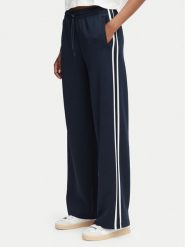 Guess Spodnie dresowe V6YB08 K4286 Granatowy Regular Fit. Niebieskie spodnie dresowe damskie Guess, z aplikacjami, z dresówki. Za 434.99 zł.