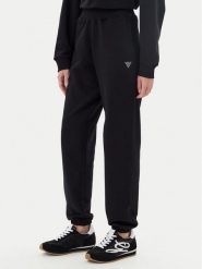 Guess Spodnie dresowe V5YB17 KCRP0 Czarny Regular Fit. Czarne spodnie dresowe damskie Guess, z aplikacjami, z bawełny. Za 229.99 zł.