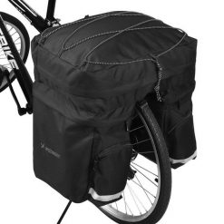 Pojemna torba rowerowa 60 L na bagażnik. Czarne torby podróżne damskie Wozinsky, bez wzorów, z materiału. Za 203.60 zł.
