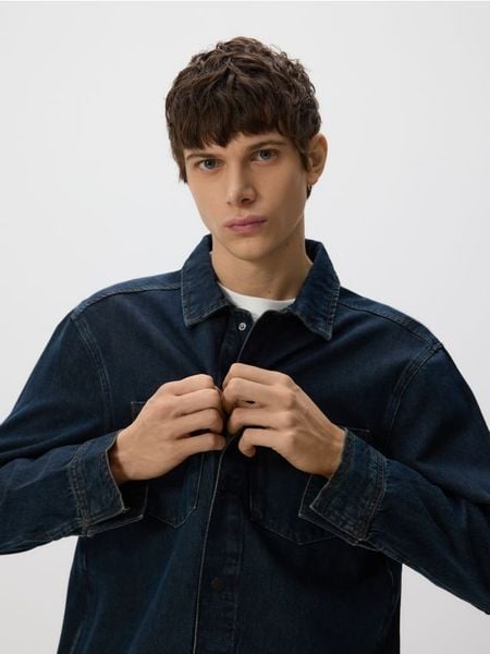 Jeansowa koszula comfort fit - indigo jeans. Niebieskie koszule męskie Reserved, l, bez wzorów, z denimu, bez kołnierzyka, bez ramiączek. Za 149.99 zł.