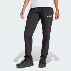 Spodnie Multi Essentials Stretch. Czarne spodnie sportowe damskie Adidas, na lato, bez wzorów, z materiału, sportowe, trekkingowe. Za 259.00 zł.