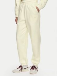 Reebok Spodnie dresowe Reebok x Ewa Chodakowska RK25981CCW Kremowy Regular Fit. Białe spodnie dresowe damskie Reebok, bez wzorów, z bawełny. Za 179.99 zł.