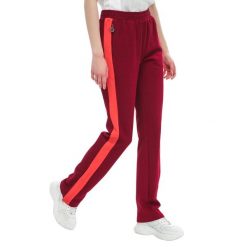 Spodnie dresowe damskie Fila Nery Track. Czerwone spodnie dresowe damskie Under Armour, bez wzorów, z bawełny, sportowe. Za 206.00 zł.