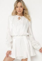 Biała Wiskozowa Sukienka Ozdobiona Wiązaniem i Falbanką Rallio. Białe sukienki damskie Born2be, na co dzień, l, z aplikacjami, z jeansu, eleganckie, bez kołnierzyka, bez ramiączek, mini, proste. Za 139.99 zł.