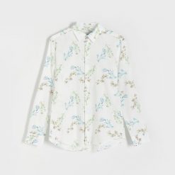 Wzorzysta koszula regular fit - wielobarwny. Koszule męskie Reserved, l, bez wzorów, z bawełny, bez kołnierzyka, bez ramiączek. W wyprzedaży za 69.99 zł.