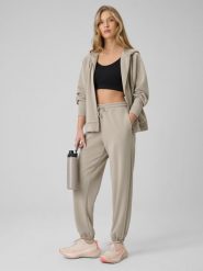 4F Spodnie z szerokimi nogawkami z modalem damskie - beżowe S. Brązowe spodnie dresowe damskie 4F, bez wzorów, z dresówki. Za 189.99 zł.