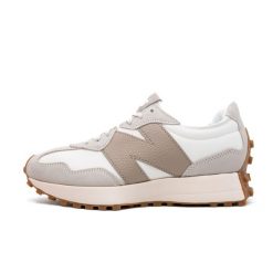 Damskie tenisówki New Balance. Brązowe trampki i tenisówki damskie New Balance, bez wzorów, z materiału, bez zapięcia. Za 601.15 zł.