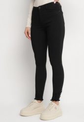 Czarne Jeansy z Wiskozą o Kroju Skinny z Przetarciami Taledis. Czarne jeansy damskie Born2be, bez wzorów, z jeansu, eleganckie, z podwyższonym stanem. Za 79.99 zł.