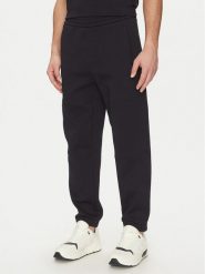 Armani Exchange Spodnie dresowe XM000354 AF10818 UB101 Granatowy Regular Fit. Niebieskie spodnie sportowe męskie Armani Exchange, m, bez wzorów, z bawełny. Za 329.99 zł.