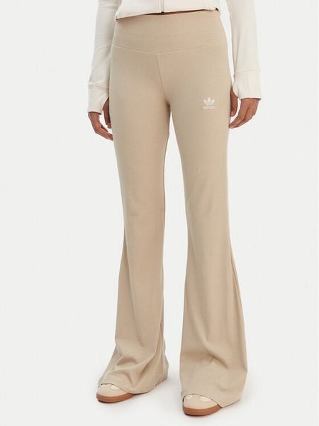 Adidas Legginsy Essentials KD3850 Beżowy Flared Leg. Brązowe legginsy damskie Adidas, bez wzorów, z wiskozy. Za 219.99 zł.