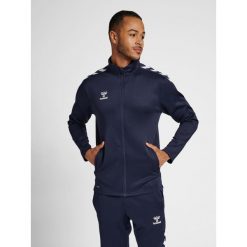 Bluza sportowa dla dorosłych Hummel Core XK Poly Zip Sweat. Niebieskie bluzy damskie Hummel, xl, bez wzorów, sportowe, bez ramiączek, bez kaptura. Za 212.50 zł.