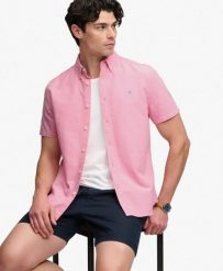 Superdry Koszula Preppy Oxford krótki rękaw z bawełny organicznej. Brązowe koszule damskie Superdry, s, bez wzorów, z bawełny, bez kołnierzyka, bez ramiączek. Za 272.80 zł.