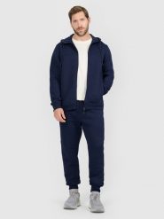 4F Spodnie dresowe joggery męskie - granatowe L. Niebieskie spodnie sportowe męskie 4F, l, bez wzorów, z dresówki, na fitness i siłownię. Za 159.99 zł.