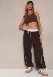 Brązowe Dresowe Spodnie z Wiskozą High Waist Ozdobione Lampasami Maiviona. Brązowe spodnie dresowe damskie Renee, bez wzorów, z dresówki, sportowe, z podwyższonym stanem. Za 109.99 zł.