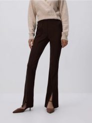 Legginsy z rozcięciami - ciemnobrązowy. Brązowe legginsy damskie Reserved, bez wzorów, z dzianiny. Za 89.99 zł.