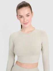 4F Longsleeve treningowy crop-top z wycięciem na plecach damski - beżowy M/L. Brązowe topy damskie 4F, l, bez wzorów, bez kołnierzyka, bez ramiączek. W wyprzedaży za 59.99 zł.