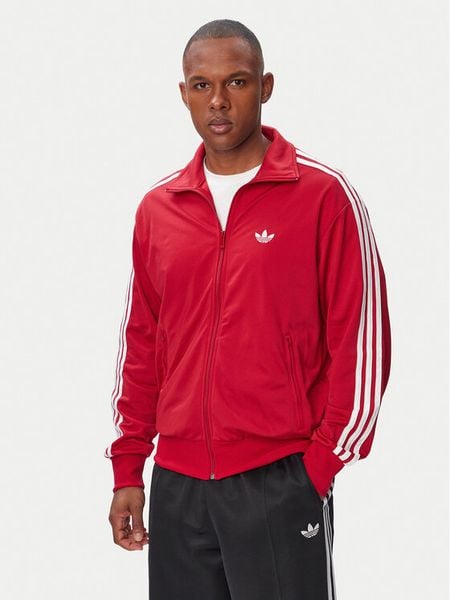 Adidas Bluza Firebird KW0116 Czerwony Regular Fit. Czerwone bluzy męskie Adidas, m, bez wzorów, z syntetyku, bez ramiączek, bez kaptura. Za 296.99 zł.
