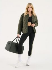 Legginsy z kontrastowym lampasem - wielobarwny. Legginsy damskie Sinsay, bez wzorów. W wyprzedaży za 22.99 zł.