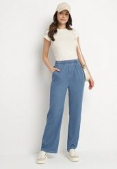 Niebieskie Szerokie Spodnie z Wiskozą Bawełną Wysokim Stanem Imitujące Jeans Caldexis. Niebieskie spodnie materiałowe damskie Born2be, bez wzorów, z bawełny, z podwyższonym stanem. Za 79.99 zł.