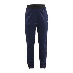 Spodnie sportowe damskie Craft Evolve. Niebieskie spodnie dresowe damskie Craft, bez wzorów, z dresówki, sportowe, długie. Za 293.00 zł.