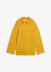 Sweter oversize ze stójką i rozcięciami po bokach. Żółte swetry nierozpinane damskie bonprix, bez wzorów, bez kołnierzyka, bez ramiączek. Za 119.99 zł.