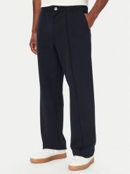 Guess Spodnie materiałowe M6YB13 K4252 Granatowy Regular Fit. Niebieskie spodnie materiałowe męskie Guess, z aplikacjami, z bawełny. Za 434.99 zł.