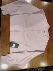Damskie bluza okrągły dekolt ATHLETICS NATURE STATE CREW. Czerwone bluzy damskie New Balance, l, bez wzorów, z bawełny, sportowe, bez ramiączek, bez kaptura. Za 282.35 zł.
