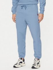 Tommy Jeans Spodnie dresowe Badge DM0DM20276 Niebieski Regular Fit. Niebieskie spodnie sportowe męskie Tommy Jeans, m, bez wzorów, z bawełny. Za 279.99 zł.