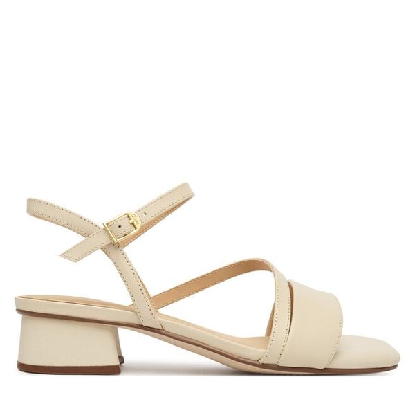 Sandały Clarks. Białe sandały damskie Clarks, bez wzorów, bez obcasa, na słupku, bez zapięcia. Za 258.99 zł.