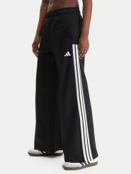 Adidas Spodnie dresowe House Of Tiro KD4299 Czarny Wide Leg. Czarne spodnie dresowe damskie Adidas, bez wzorów, z bawełny. Za 259.99 zł.