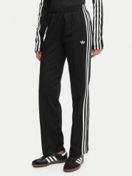 Adidas Spodnie dresowe Firebird Classic KD5575 Czarny Regular Fit. Czarne spodnie dresowe damskie Adidas, bez wzorów, z dresówki. Za 299.99 zł.