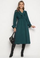 Ciemnozielona Rozkloszowana Sukienka z Gumką w Talii z Kopertowym Dekoltem i Falbanką Florisse. Zielone sukienki damskie Born2be, na co dzień, na lato, bez wzorów, eleganckie, bez kołnierzyka, bez ramiączek, midi, kopertowe. Za 69.99 zł.