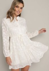 Jasnobeżowa Rozkloszowana Sukienka z Tkaniny Plumeti ze Ściągaczem w Talii i Falbanką Ilisia. Brązowe sukienki damskie Born2be, l, bez wzorów, z tkaniny, boho, bez kołnierzyka, bez ramiączek, mini, rozkloszowane. Za 79.99 zł.
