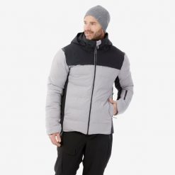 Kurtka narciarska męska Quechua 500 Warm. Czarne kurtki sportowe męskie WED'ZE, na zimę, m, bez wzorów, z włókna, bez kaptura, narciarskie. Za 499.99 zł.
