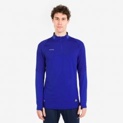Bluza piłkarska Kipsta CLR półsuwak. Niebieskie bluzy męskie KIPSTA, l, bez wzorów, z materiału, sportowe, bez ramiączek, bez kaptura. Za 129.99 zł.