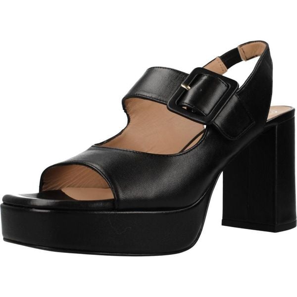 Sandały UNISA ODELA NTO Czarny. Czarne sandały damskie Unisa, bez wzorów, ze skóry, bez obcasa, bez zapięcia. Za 597.99 zł.