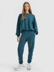 4F Spodnie dresowe joggery z modalem damskie - turkusowe XS. Niebieskie spodnie dresowe damskie 4F, bez wzorów, z dresówki. W wyprzedaży za 79.99 zł.