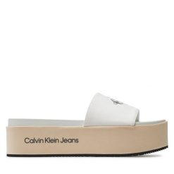 Klapki Calvin Klein Jeans. Klapki damskie Calvin Klein Jeans, bez wzorów, z jeansu, bez obcasa, bez zapięcia. Za 299.99 zł.