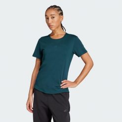 Koszulka Joga Essentials. Niebieskie bluzki damskie Adidas, s, bez wzorów, sportowe, bez kołnierzyka, bez ramiączek. Za 149.00 zł.
